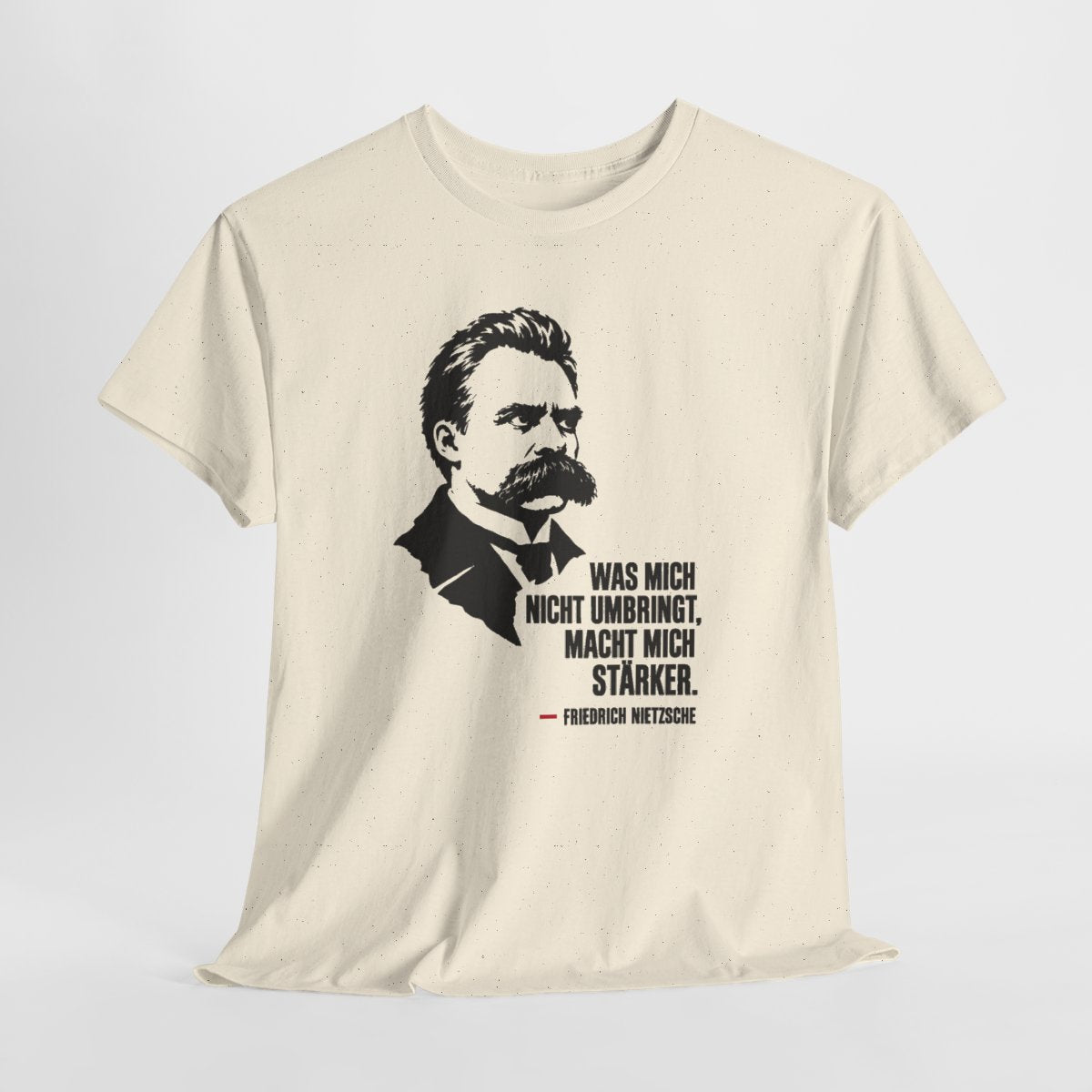 Unisex T-Shirt mit Zitat - Friedrich Nietzsche - Was mich nicht umbringt – hanging-1